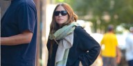 Ashley Olsen Bundles Up in Scarf & Sweater Despite Warm New York City Weather 