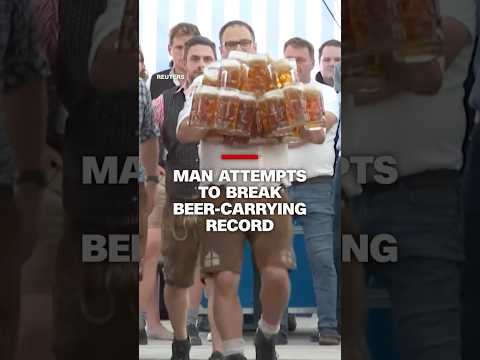 Man attempts to break beer-carrying record