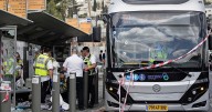 Gunmen kill six at a Jerusalem bus stop