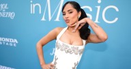 Becky G’s Daring Sculptural Outfit in Exhibition Photos Is a Treat to Your Senses