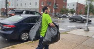 College students from across Philadelphia join forces to clean up football field
