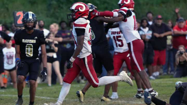 Manual football overcomes early deficit, tops Atherton behind Mack, Traynor