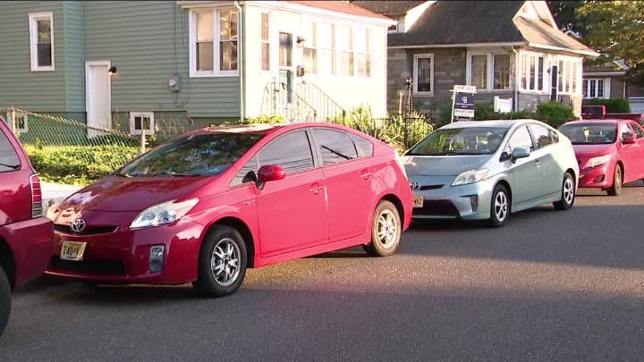 Parents charged after teens accused of over two dozen car break