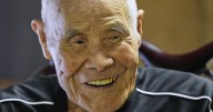 Japanese man becomes oldest to summit Mount Fuji at 102 with help from his family