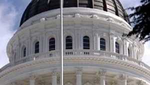 California lawmakers pass bill barring authorities from wearing face masks