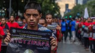 Con violencia, concluye marcha por el 11 aniversario de desaparición de normalistas