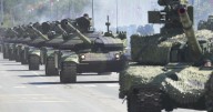 Serbia stages a large military parade to showcase tanks, jets and missile systems