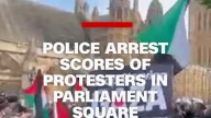 Police arrest protesters in London’s Parliament Square