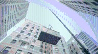 What was happening on 17th Street? Crane hoists 22,000-Ib boiler onto historic Denver building