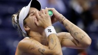 Defending US Open champ Sabalenka returns to semifinals when Vondrousova withdraws with knee injury