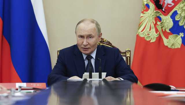 Putin says Russia will stick to nuclear arms limits for 1 more year