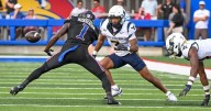 COLUMN: It's an odd couple front and center in key game for WVU