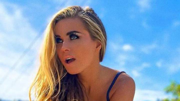 Carmen Electra, 53, shows fit body in bra and super short shorts as ageless model teases 'cheeky!'