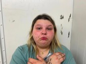 A woman is behind bars in Booneville