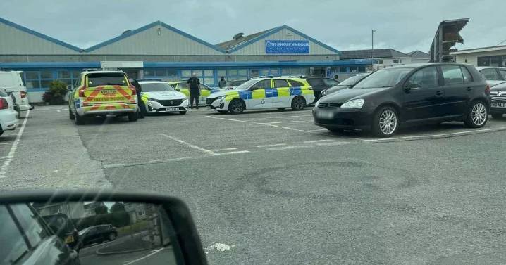 Woman arrested after axe alert saw UK schools placed in lockdown