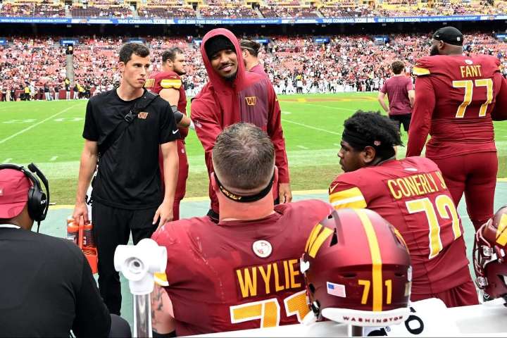 Commanders QB Jayden Daniels, recovering from knee sprain, remains day to day