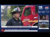 Multiple homes evacuated after brush fire on I-5 spreads to nearby neighborhood