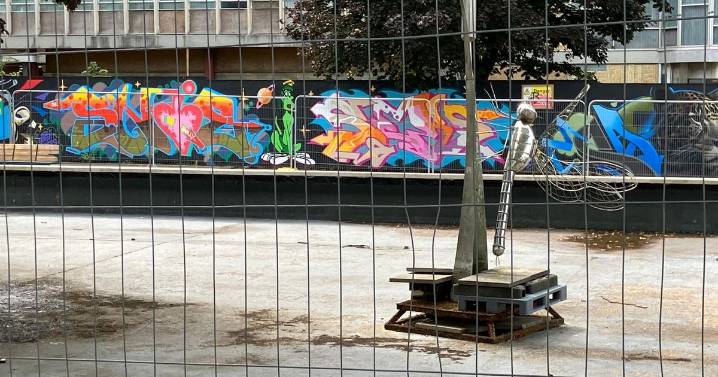 Angry locals say 'demolish the lot' as Civic Square pond left dry