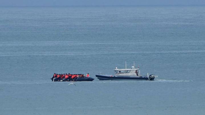 First migrants arrive in UK from France under the 'one in, one out' policy