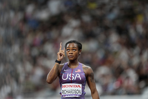 Sha'Carri kicks into overdrive and cruises through opening round at world championships