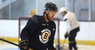 David Pastrnak makes debut at Bruins training camp, isn't concerned about knee tendinitis