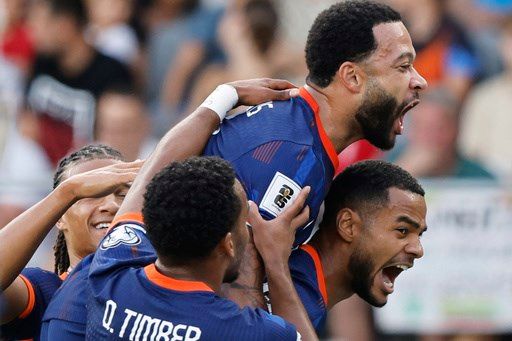 Depay is Netherlands' all-time top scorer with 52 goals, Germany gets first win in WCup qualifying
