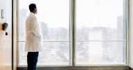 Hospital patient looks outside window and spots something that makes heart sink