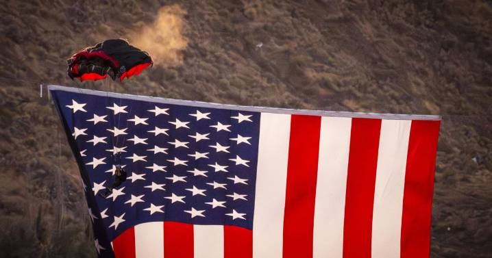 BASE jumpers take leap as The Patriot looms over them