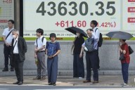 Asian shares rise after Japan’s prime minister resigns