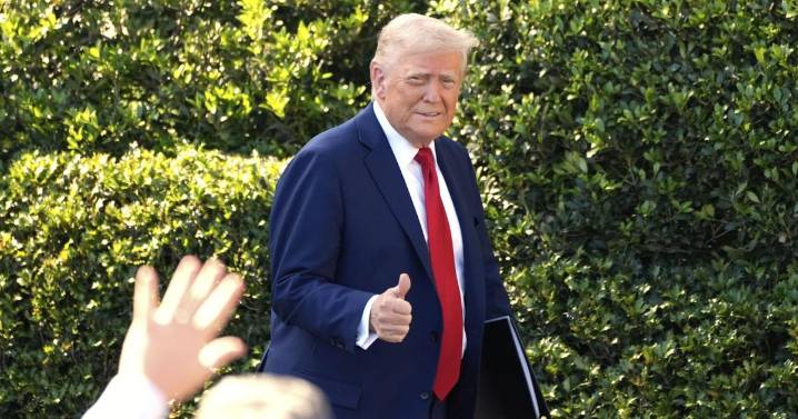 Trump draws cheers and boos while marking 9/11 by attending a New York Yankees game