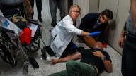 Federal agents grab and shove journalists outside Manhattan immigration court, sending one to hospital