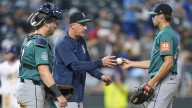 Royals score four in the eighth to snap Seattle's 10