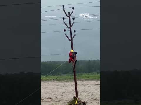 Man saved after clinging to pole for hours amid flooding in India