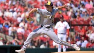 Brewers clinch NL Central despite loss to Cardinals