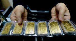 Vietnam jails former officials over gold bar graft: state media