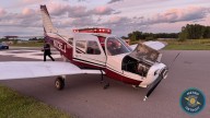 Small plane loses landing gear, skids down runway during emergency landing at Michigan airport