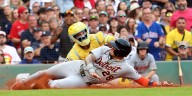 Tigers clinch AL playoff berth with 2-1 win over Red Sox. Detroit’s division hopes still alive