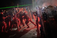 Serbian police fire tear gas at protesters  demanding free elections and justice