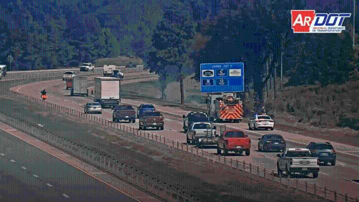 Grass fire slows traffic on I-430 near Shackleford Road