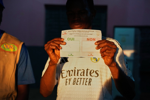 Guinea counts votes in a referendum that could allow junta leader to run for president