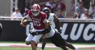 Mendoza throws 4 TDs in Indiana's 56