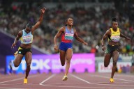 Athletics-American Jefferson-Wooden wins women’s 100 metres world title