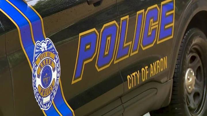 Woman shot at two drivers on Akron road: police