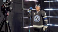 Do Lightning players prefer to smile or snare in media day photos?