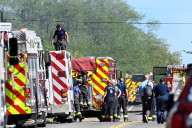 Police remain on scene at burned out Michigan church after shooting and fire leave 4 dead, 8 wounded