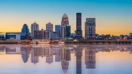 How will Louisville be affected if the federal government shuts down?
