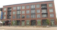 Riverfront development continues with the second residential building opening