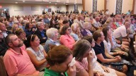 Southport remembers mass shooting victims at prayer vigil