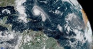 Tropical depression less likely to hit US as Humberto turns