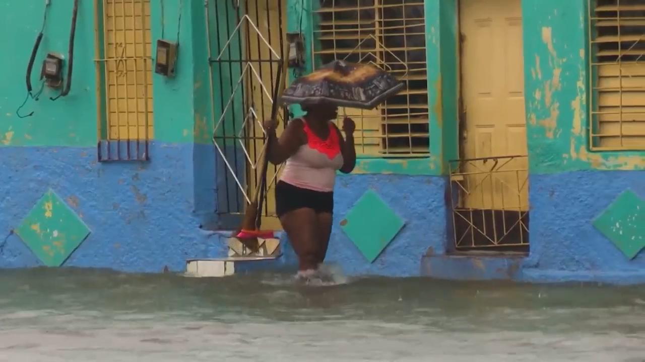 Tropical Storm Imelda hits Cuba and the Bahamas with heavy rain causing floods